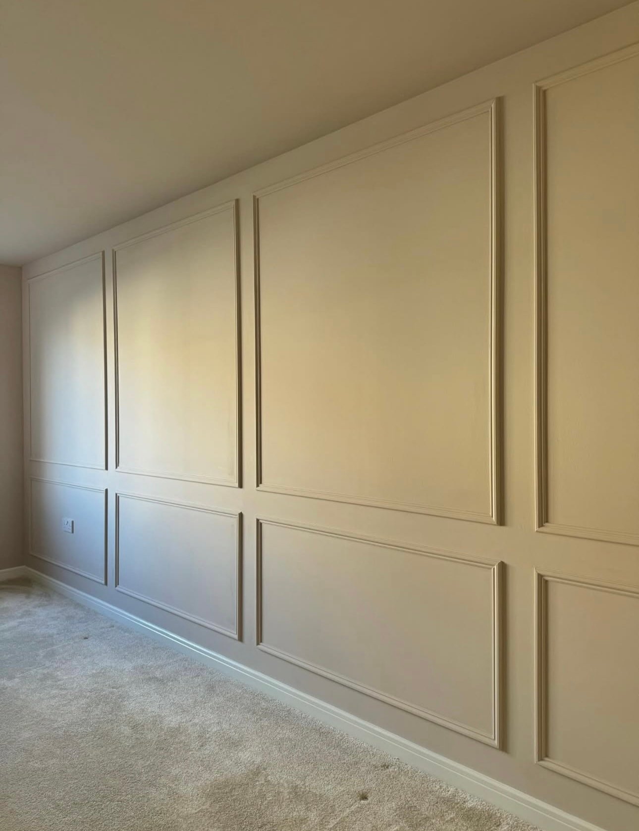 Close-up detail of decorative wall panelling by Erol Contractors in Battersea